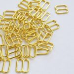 Reguladores de metal dorado 10mm para sujetadores | Set de 2 piezas