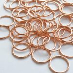 Arandelas de metal dorado rosa 15mm para lencería | Set de 2 piezas