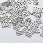 Ganci a G argentati 12 mm per reggiseno