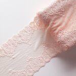 Light peach floral stretch lace trim fabric