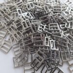 Regolatori quadrati in metallo argentato 12mm, set da 2 pezzi
