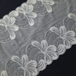 Tissu de dentelle extensible blanc antique
